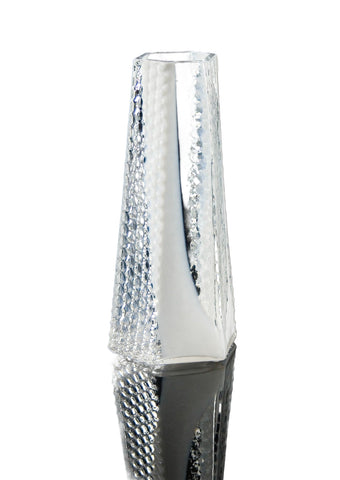 A clear glass vase with a geometric pattern, featuring a triangular shape and a reflective surface.