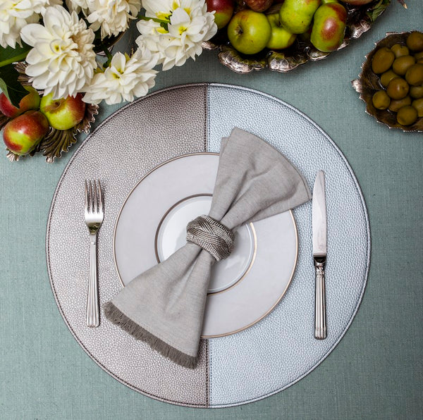 SPLIT ROUND REVERSIBLE PLACEMAT IN SILVER + BLUE